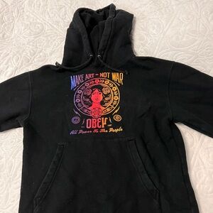 Obey Black Hoodie with Subtle Design